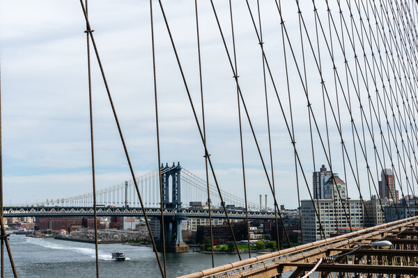 New York, USA - September 21, 2015: View of Manhattan bridge from Brooklyn Bridge in New York.