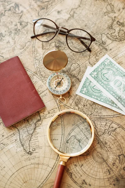 Vintage compass, magnifying glass, pocket watch