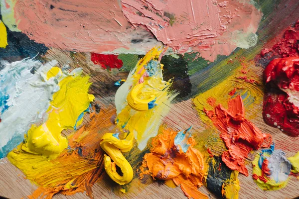 Closeup of paint mixing process in art workplace. — Stock Photo, Image