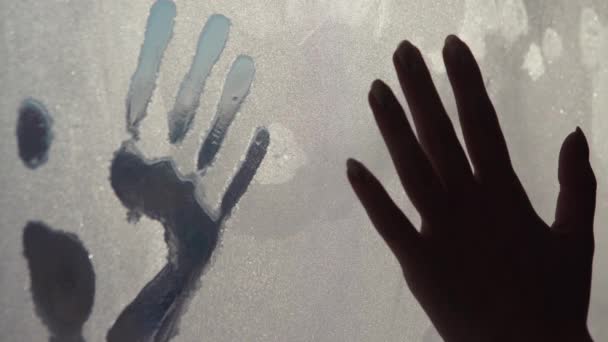 Hand prints in ice — Stock Video