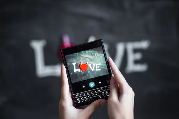 Valentines day background with hearts in chalkboard — Stock Photo, Image