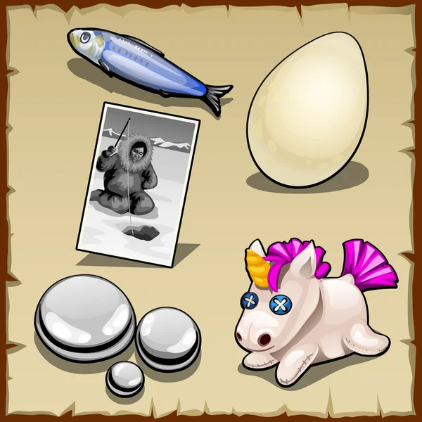 Balıkçı, yumurta, oyuncak ve taşlar