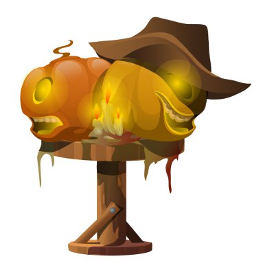 Carved pumpkins, candles and cowboy hat on table