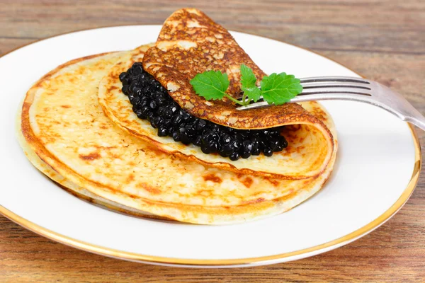Pancakes with Black Caviar — Stock Photo, Image