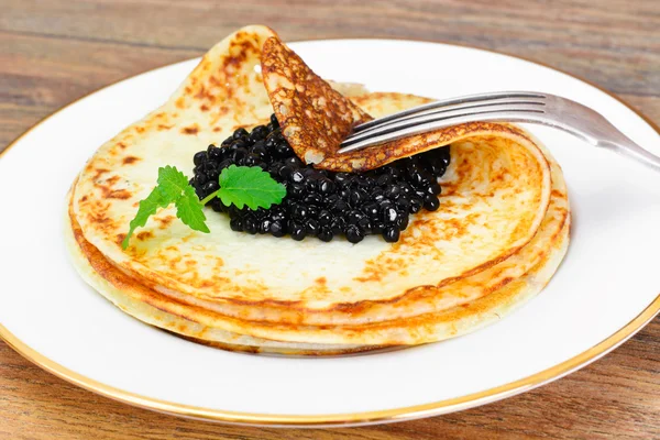 Pancakes with Black Caviar — Stock Photo, Image
