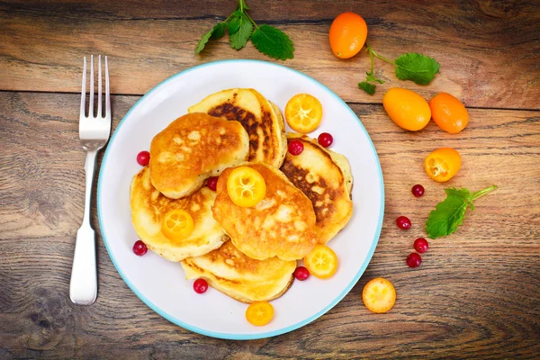 Pfannkuchen mit Kumquats und Preiselbeeren — Stockfoto