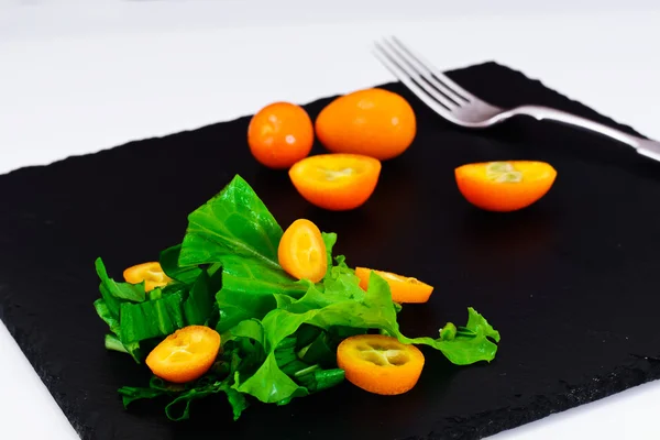 A medvehagyma, Kumquats saláta — Stock Fotó