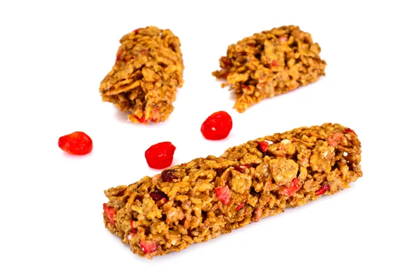 Muesli bars with sunflower seeds, nuts and dried cherries — Stock Photo, Image