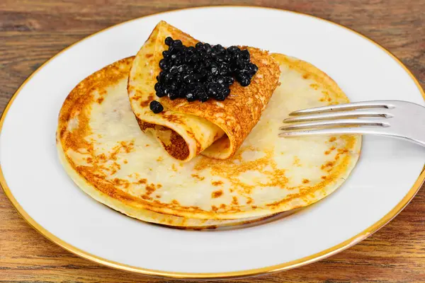 Pancakes with Black Caviar — Stock Photo, Image