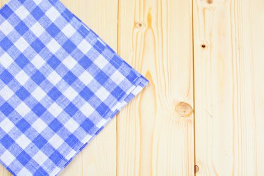 Işık arka plan üzerinde hizmet veren mutfak peçete