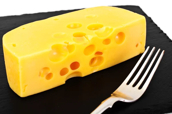 Swiss Cheese on Black Background — Stock Photo, Image