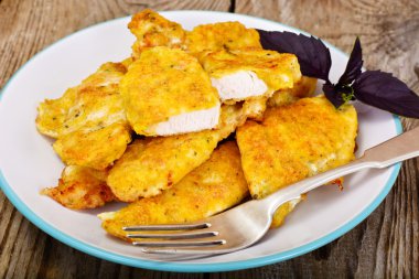 Ekmekli tavuk fileto otlar ile