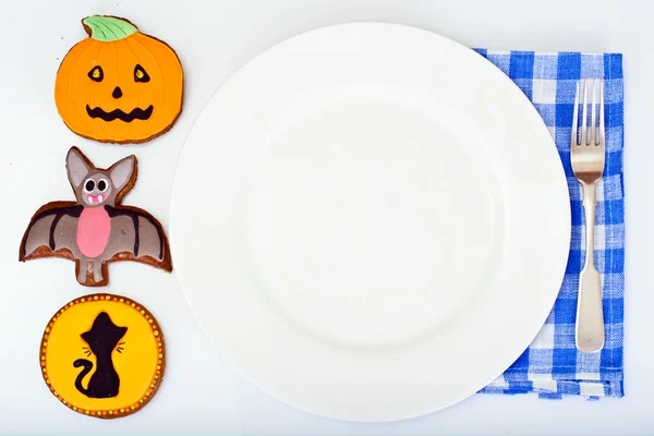 Gingerbread for Halloween with Empty White Plate and Place for Y — Stock Photo, Image