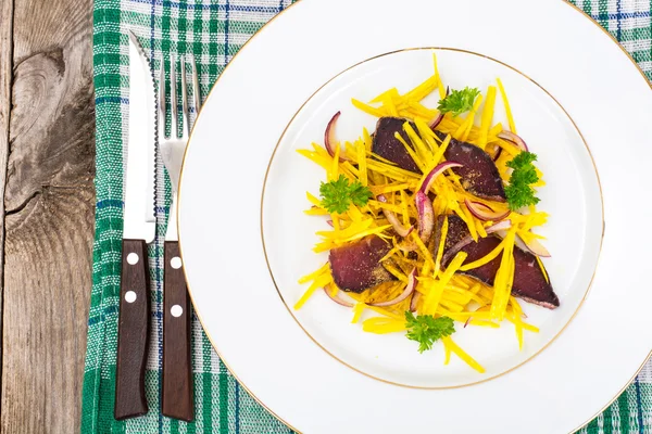 Salad of Yellow Beets with Red Onion and Beef Jerky