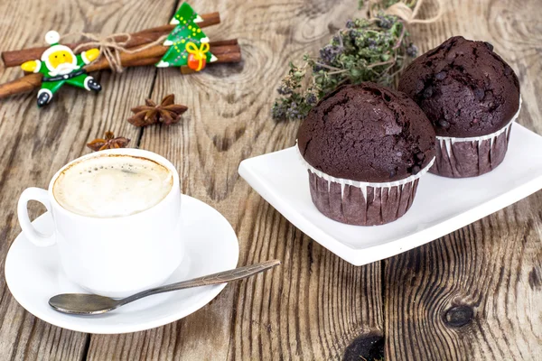 Chocolate Muffin with Coffee and Christmas Tree Background — Stock Photo, Image