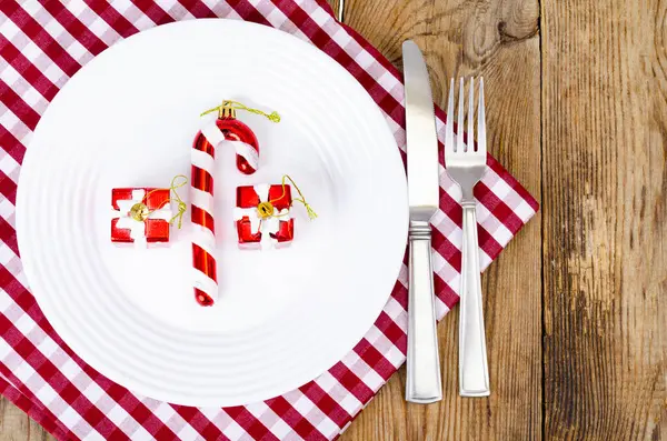 Christmas New Years Concept White Plate Red Tablecloth — Stock Photo, Image