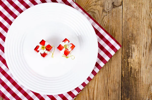 Christmas New Years Concept White Plate Red Tablecloth — Stock Photo, Image