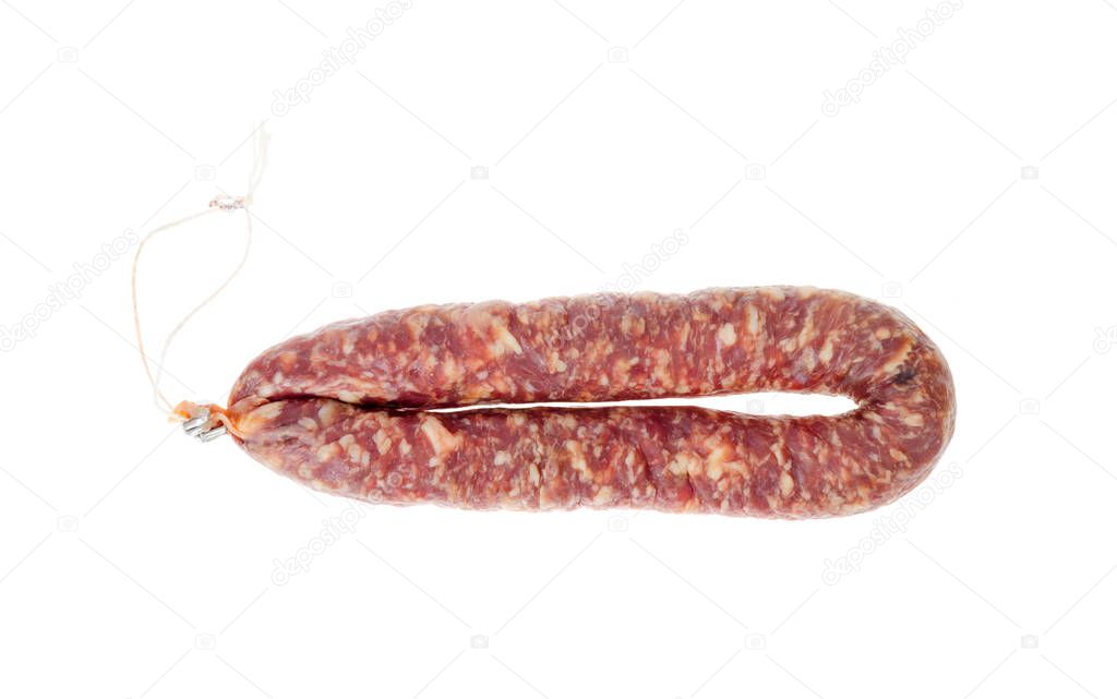Homemade pork dried cured sausage on white background. Studio Photo