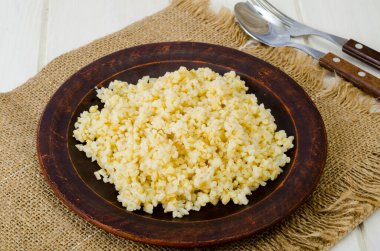 Kaynamış bulgur Groats, vejetaryen lapası. Stüdyo Fotoğrafı