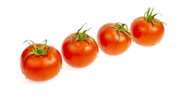 Vier Rote Nasse Tomaten Isoliert Auf Weißem Hintergrund Studioaufnahme — Stockfoto