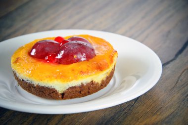 Meyveli kek Vintage Retro Woody arka plan üzerinde