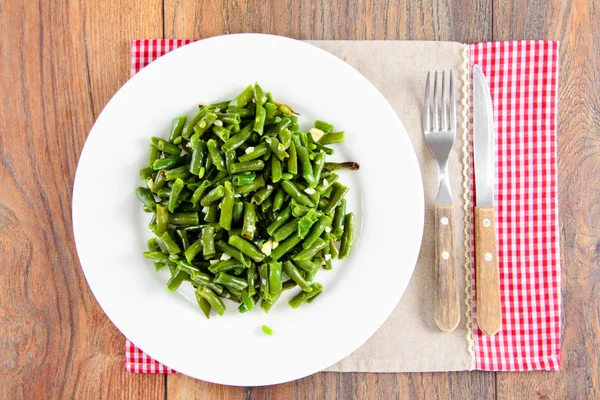 Green Beans Fried with Garlic on a White Plate. — Stock Photo, Image