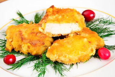 Breaded Chicken Fillet with Herbs and Cranberries clipart