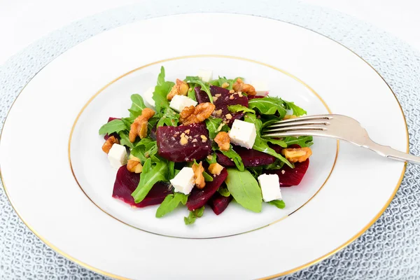 Salad of Raw Beets, Pears, Arugula, Roots, Sunflower Seeds and C — Stock Photo, Image