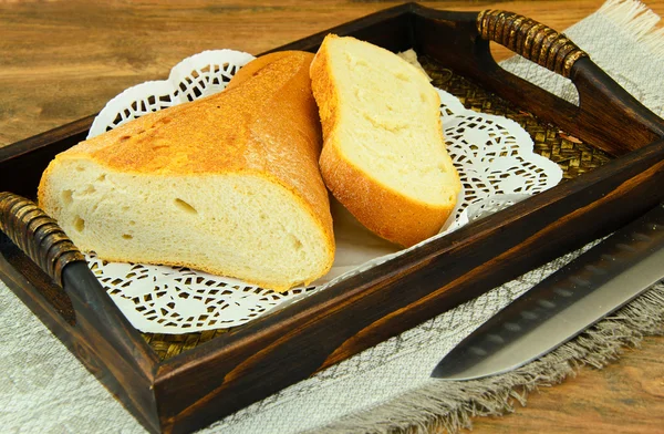 Fresh Tasty Bread on Woody Background — Stock Photo, Image