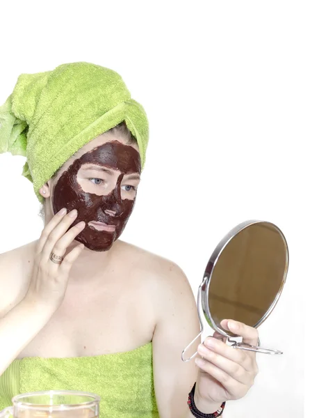 Menina com máscara cosmética — Fotografia de Stock