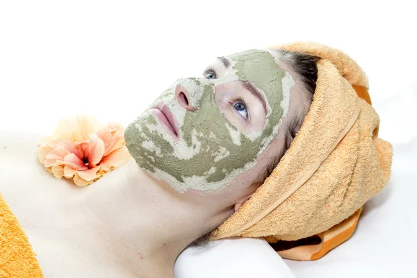 Ragazza con maschera cosmetica — Foto Stock