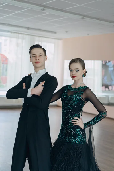 Professional dancers dancing in ballroom