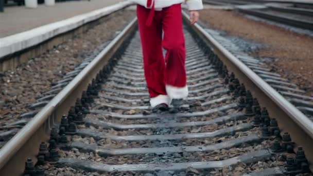 Santa Claus on train tracks — Stock Video