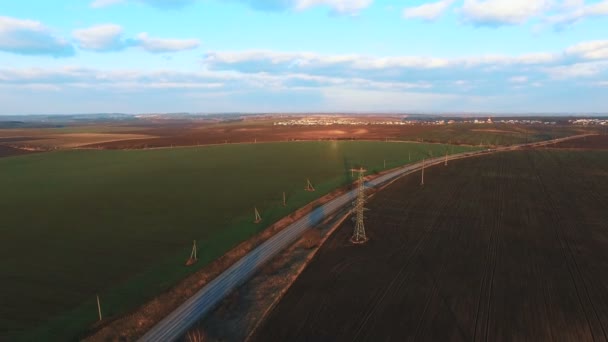 Aerial view to fields and road. 4k — Stock Video