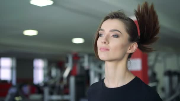 Close-up of a girl on a treadmill. 4k — Stock Video