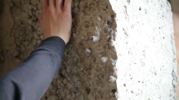 Man hand touching wall of old man — Stock Video