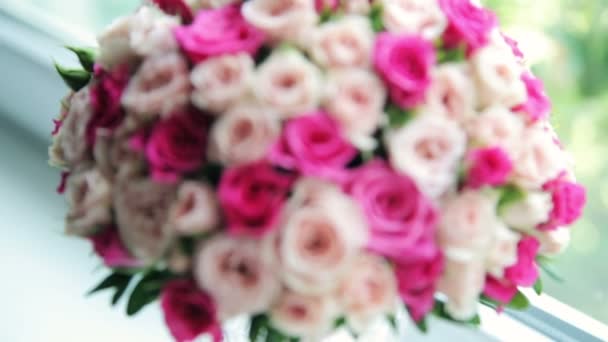 Wedding bouquet on window-sill — Stock Video