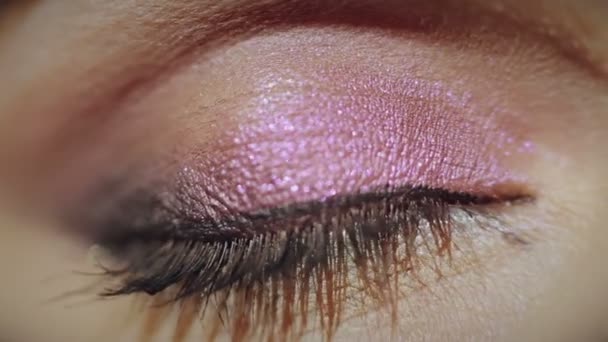 Painted eye beautiful girl. Close-up — Stock Video
