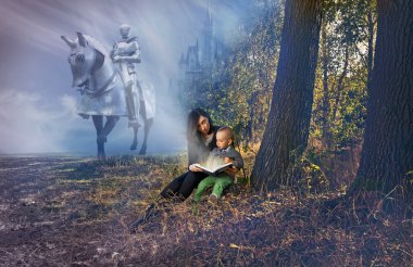Mother and young son reading fairy tales