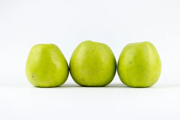 Three green apples on a white background — Stock Photo, Image