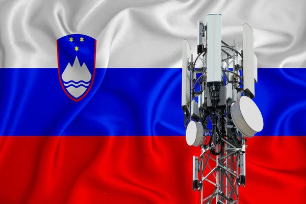 Slovenia flag, background with space for your logo - industrial 3D illustration. 5G smart mobile phone radio network antenna base station on the telecommunications mast emitting signal. 3D-rendering