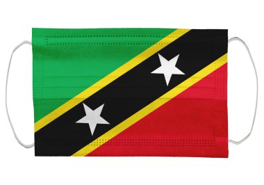 Tıbbi bir maskede Aziz Kitts bayrağı. Beyaz bir arka planda izole edilmiş. Corona virüsü ya da covid-19 için koruyucu solunum maskeleri virüs enfeksiyonu için, sağlık koruma konsepti, ağız kapağı, 3 boyutlu görüntüleme