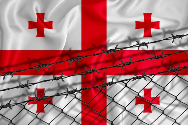 Georgia flag development, fence mesh and barbed wire. Emigrants isolation concept. With place for your text.