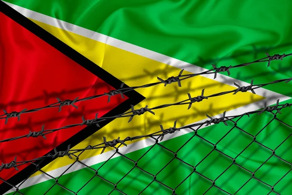 Ανάπτυξη Σημαίας Guyana Συρματόπλεγμα Και Συρματόπλεγμα Έννοια Απομόνωσης Μεταναστών Θέση — Φωτογραφία Αρχείου