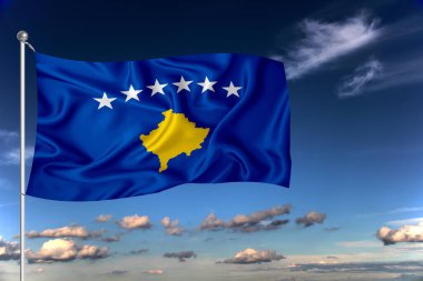 Kosova ulusal bayrağı derin mavi gökyüzüne karşı rüzgarda dalgalanıyor. Uluslararası ilişkiler kavramı.