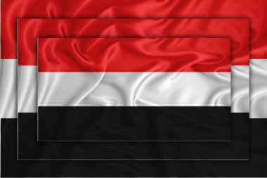 Arka planda Yemen bayrağı var. Birbirine üç bayrak çekiliyor. Tasarım çözümleri kavramı. 3 Boyutlu Hazırlama