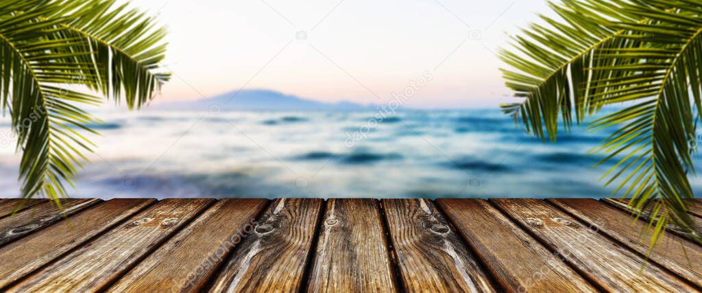 empty wooden table on background of sea, panoramic image