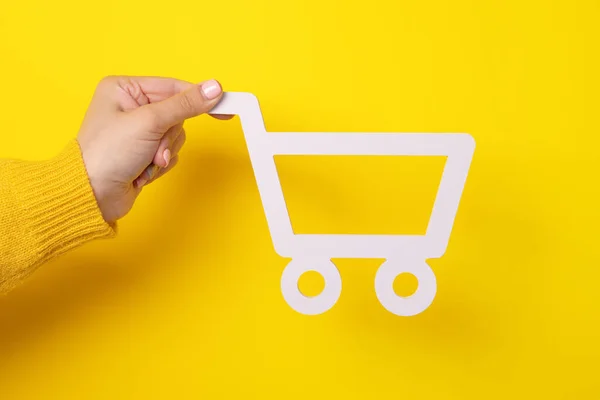 Shopping Cart Female Hand Yellow Background — Stock Photo, Image