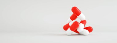 Gri arka plan üzerinde kapsül hapları, sağlık ve eczane konsepti, panoramik yerleşim imajı, 3D görüntüleme