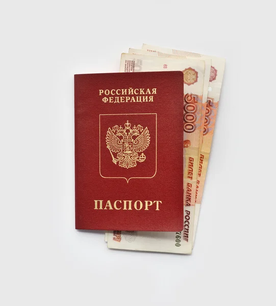 Russian passport with a money rubles banknotes on a white background — Stock Photo, Image